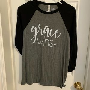 Grace wins baseball tee